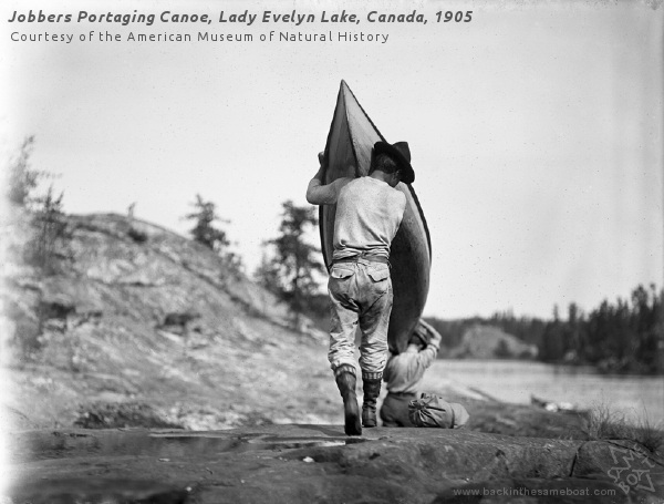 Jobbers Portaging a Canoe on Lady Evelyn Lake, Canada, 1905 - Photo on Backinthesameboat.com